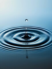 A close-up of a water droplet impact with ripples, on a gradient blue background, depicting the concept of purity