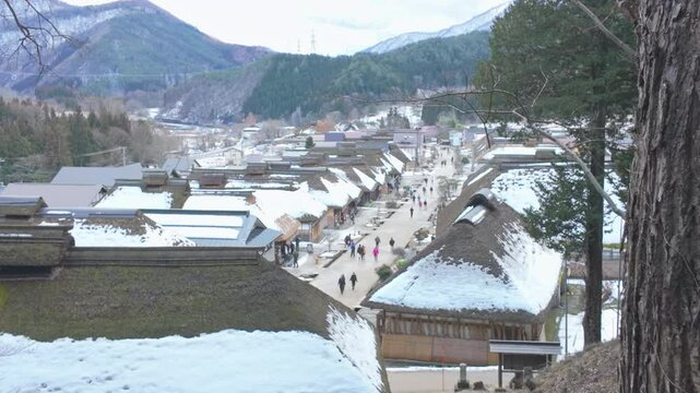 Ouchi Juku ancient farmer house village with snow in winter, former post town along the Aizu-Nishi Kaido trade route during the Edo Period. Shimogo town, Minamiaizu, Fukushima Prefecture, Japan