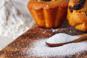 muffins baked with the addition of ammonium carbonate on a wooden rustic background
