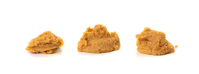 Miso paste isolated. Japanese shiro miso seasoning sauce, fermented soybean spread, brown soy cream