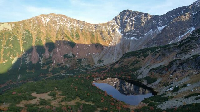 Aerial autumn view of lake Rohachske pleso in High Tatras in Slovakia