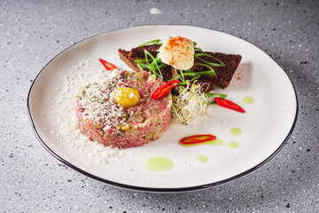 delicious fresh beef tartare on a white plate