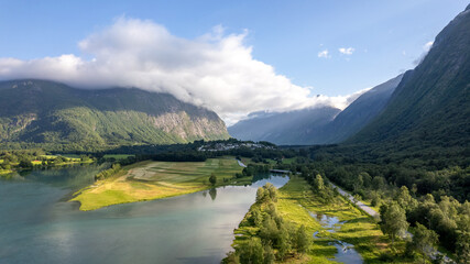 Obraz premium fjord and mountains in Andalsnes with the sunset and lake, summer in Norway countryside Rauma