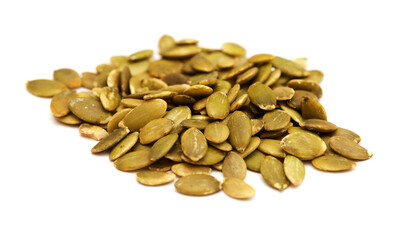Hulled pumpkin seeds isolated on white background
