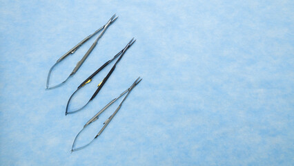Micro Needle Holders are instruments that surgeons use to grasp and handle needles when they suture wounds. Medical instruments used in the operating room.