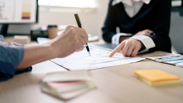 Architects designer team working with color palette chart