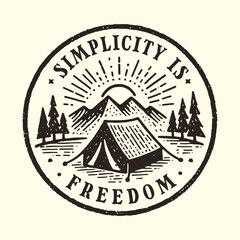 vintage emblem design of a tent in a nature range with a quote Simplicity is Freedom