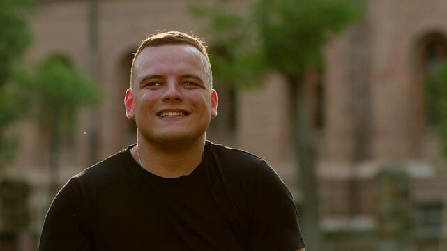 Portrait of a visually impaired person. Happy disabled man looking at camera and smiling.