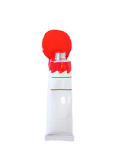 Tube with red acrylic paint on a white background, bright red light