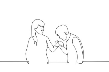 man kisses woman's hand - one line art vector. concept gentleman