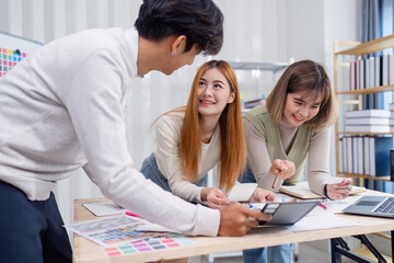 Creative Team Collaborating on UX UI Design Project in Modern Office Environment