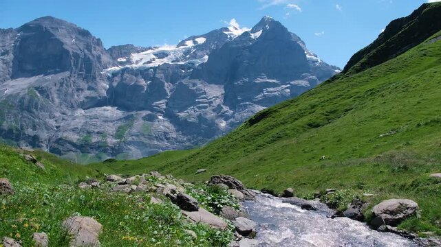 Steady shot of mountain of Grindelwald valley in Switzerland Bernese Alps