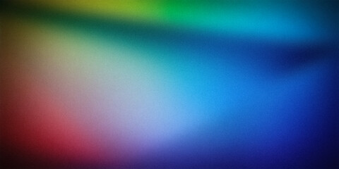 A colorful gradient background blending shades of green, blue, and red. The smooth transition between the colors creates a vibrant and dynamic visual effect, ideal for modern designs