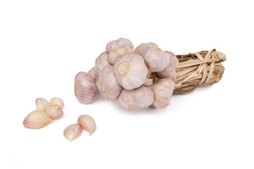 Bunch of garlic bulbs and cloves isolated on white background with clipping path closed up.