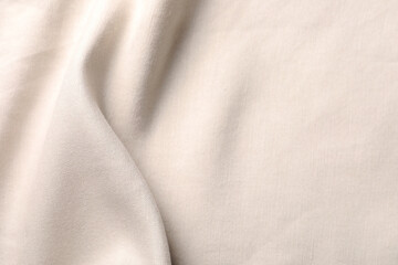 Texture of beige fabric as background, top view