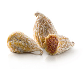 Tres higos secos sobre fondo blanco. Three dried figs on white background