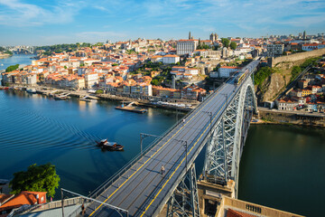 View of Porto city and Douro river and Dom Luis bridge I with metro tram from famous tourist viewpoint Miradouro da Serra do Pilar. Porto, Vila Nova de Gaia, Portugal