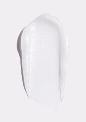 sample smear of cosmetic peeling gel on a light gray background close-up