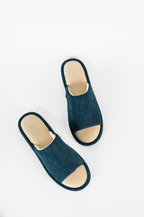 Blue slippers on a white background