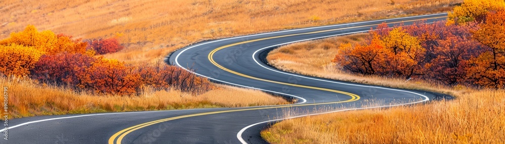 Poster Winding Road Through Autumn Landscape.