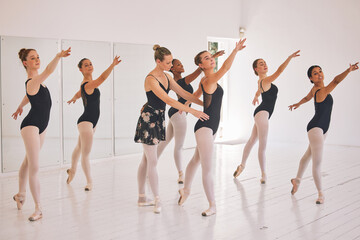 Class, ballet and teacher with students for learning, art and creative dance performance. Group, ballerina instructor and woman with girls for choreographic exercise, training and help with posture © Alex Shared/peopleimages.com