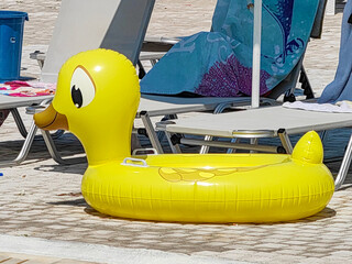Big Yellow Rubber Ducky by the Swimming Pool: Summer Time Vibes.
