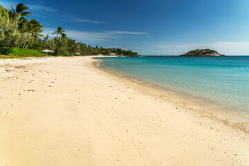 Picturesque tropical sandy Anchor Beach with turquoise water on Lizard Island. Lizard Island  is located on Great Barrier Reef in north-east part of Queensland, Australia