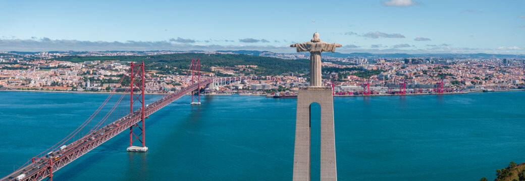 Aerial view of Sanctuary of Christ the King or Santuario de Cristo Rei on sunny summer day in Lisbon, Portugal.