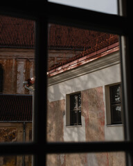 Old Building Seen Through Window Frame