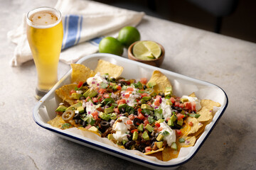 american style football day nacho with beer