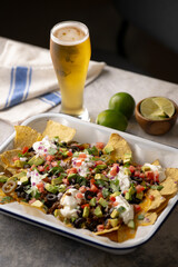 american style football day nacho with beer