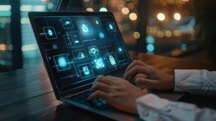 Hands typing on laptop