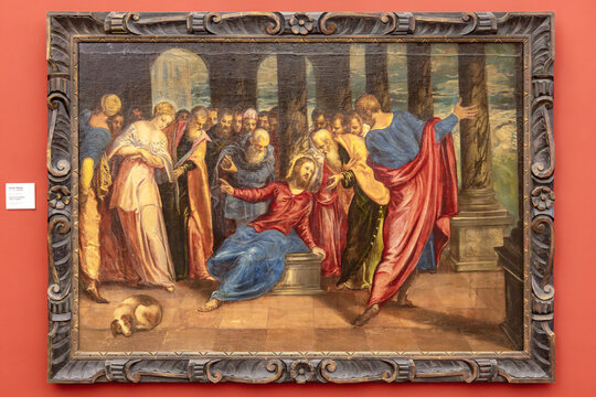 Prague, Czech Republic - May 25, 2024: Painting Christ and the Woman Taken in Adultery by Jacopo Robusti, best known as Tintoretto, Italian Renaissance painter of the Venetian school