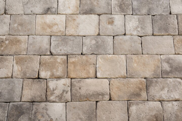 Obraz premium Processed collage of ancient yellow block wall texture. Background for banner, backdrop or texture