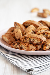 Homemade Cantuccini Cookies with Chocolate Chips on a Plate, low angle view. Close-up.