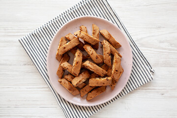 Homemade Cantuccini Cookies with Chocolate Chips on a Plate, top view.