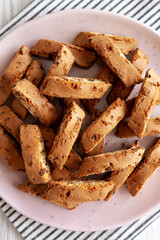 Homemade Cantuccini Cookies with Chocolate Chips on a Plate, top view.
