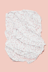 Smears of body scrub on pink background. Fruit and berry body scrub texture of the swatch. Cosmetic smear