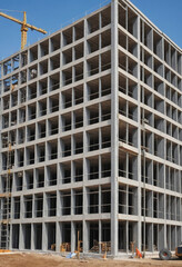  A split-image showcasing the construction of a building from start to finish. 