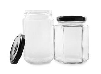 Two empty glass jars isolated on white