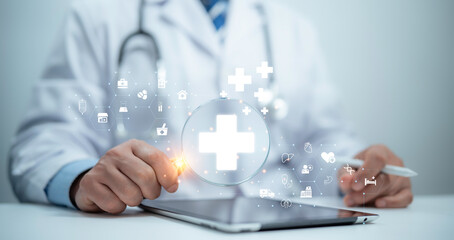 Medical worker hold digital medical cross, symbolizing network connectivity and analysis with modern healthcare interface. medical technology healthcare networks and futuristic concept
