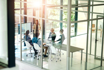 Business woman, presentation and meeting room glass with conference and digital chart. Speaker, financial and accounting data with workshop and presenter in office with company stats review above