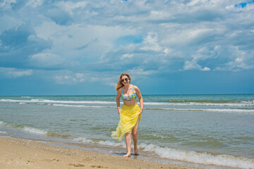 Natural woman's beauty concept. Lady at the beach in romantic feminine style