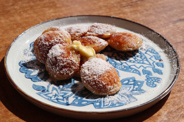 A plate of poffertjes
