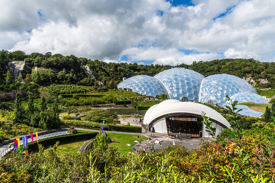 Eden Project, Cornwall, England ? August 14, 2023: visitor attraction and educational centre with huge greenhouses, one featuring rainforest climate and plants.
