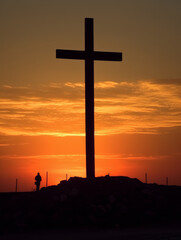 A cross of Jesus at sunset