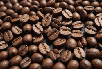 Naklejka premium Macro shot of coffee beans with a roasted, textured surface. 