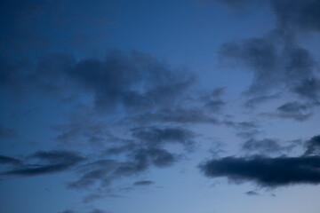 Obraz premium dark storm clouds on a blue sky background