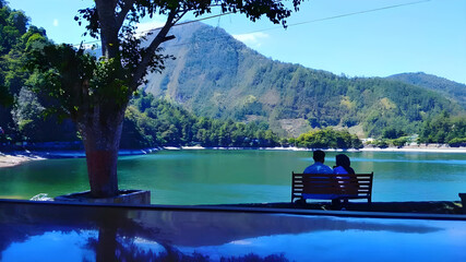 Capture the serene beauty of Telaga Sarangan, a hidden gem in East Java. 