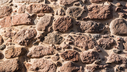architectural background, ancient wild stone masonry.